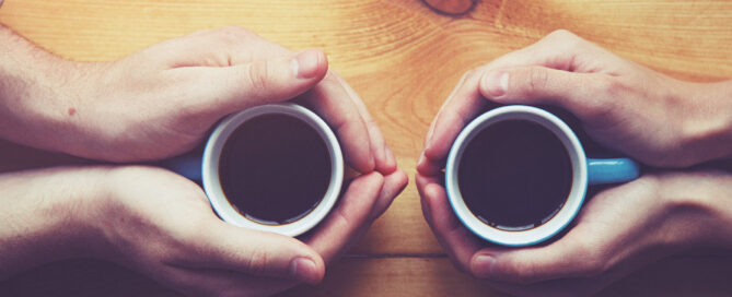 Two coffee cups representing effective relationships
